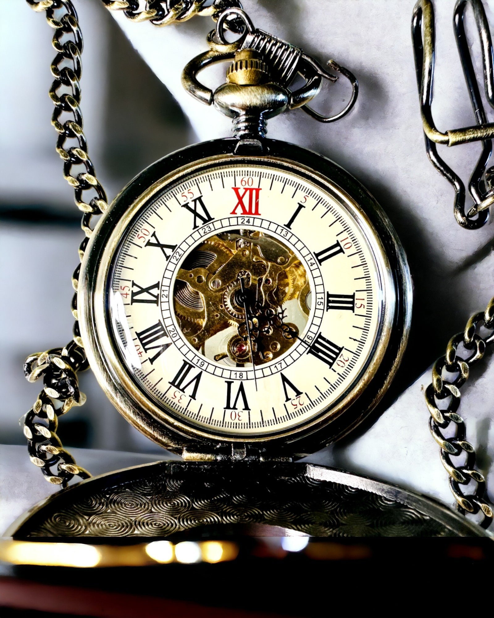 Pocket watch with a visible mechanism – personalization option through engraving